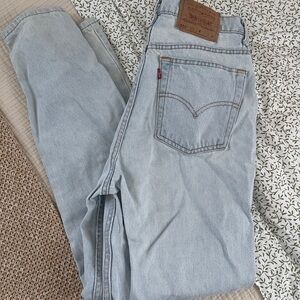 Vintage Levi's 521 light wash denim jeans woman’s 12 high waisted tapered fit